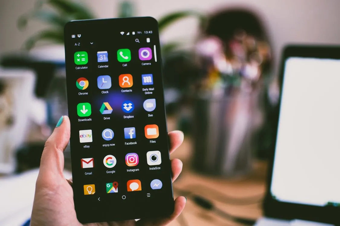 how to free up space on android without deleting photos - android phone with apps open