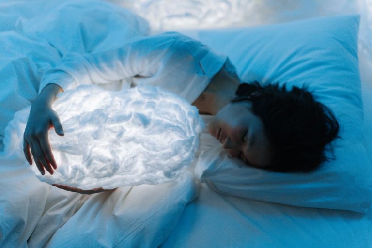 how does the military sleep method work - woman sleeping peacefully at night